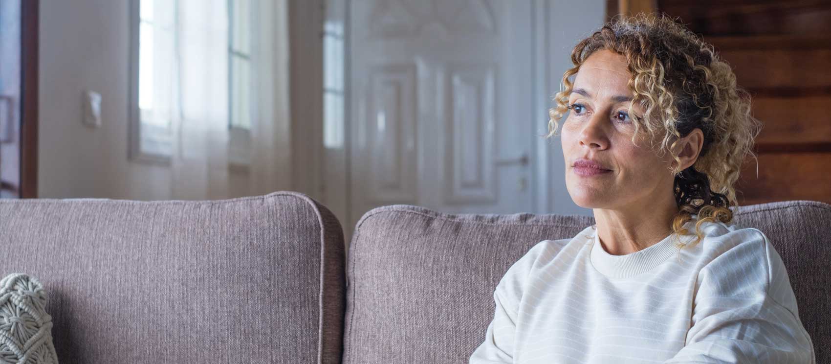 woman sitting alone dealing with depression